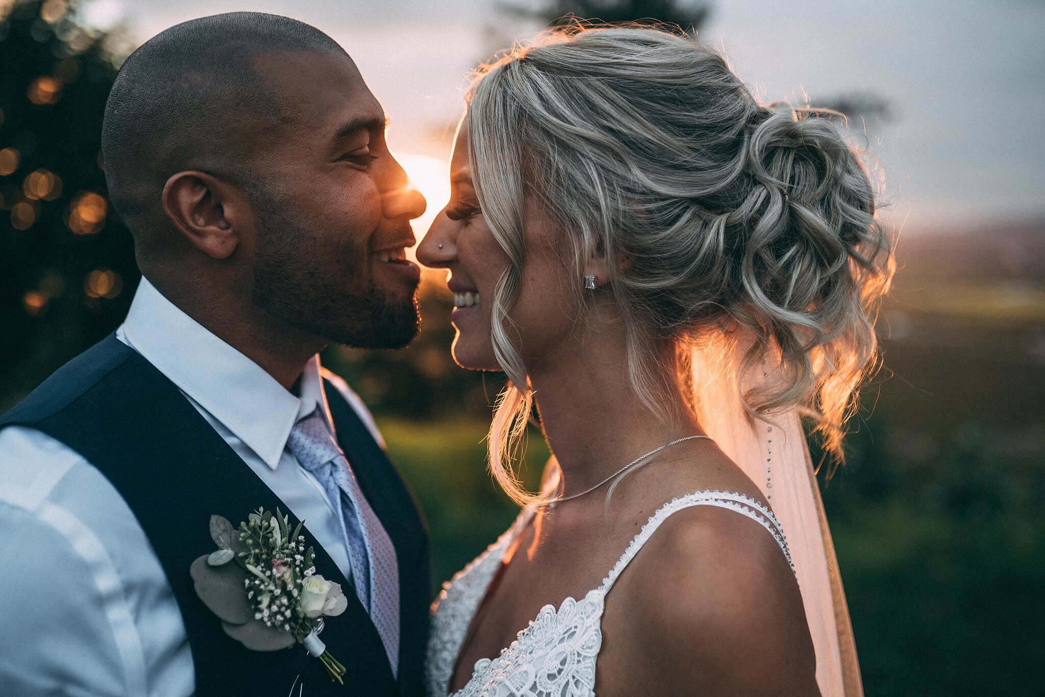 groom almost kissing brides nose 