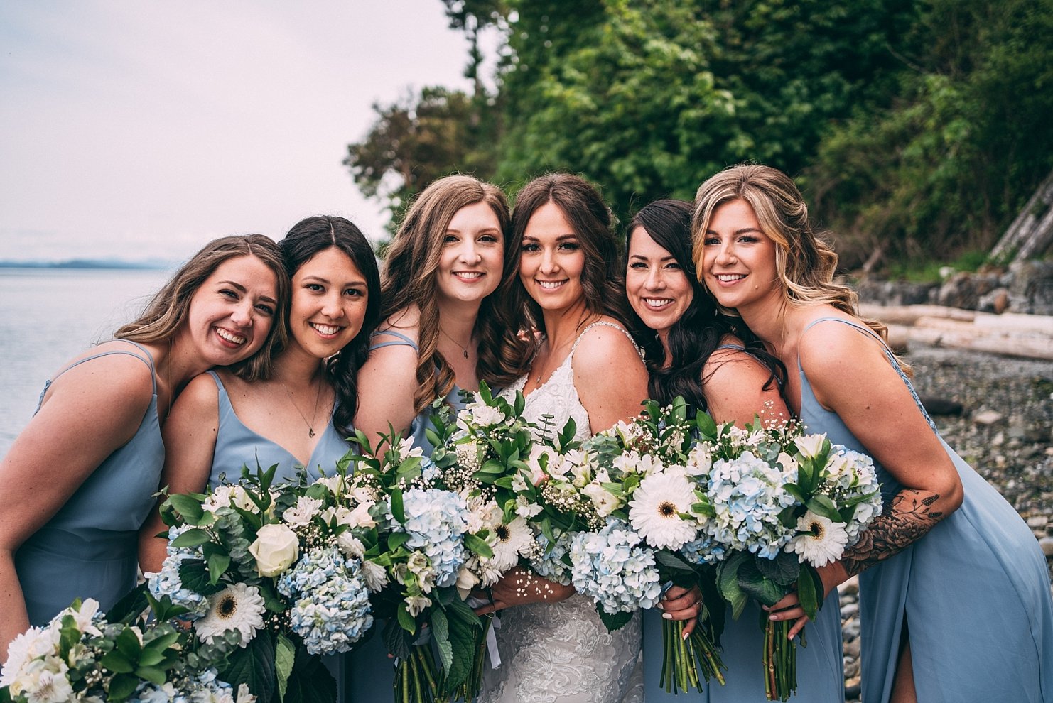 blue bridesmaid dresses with white and blue flowers